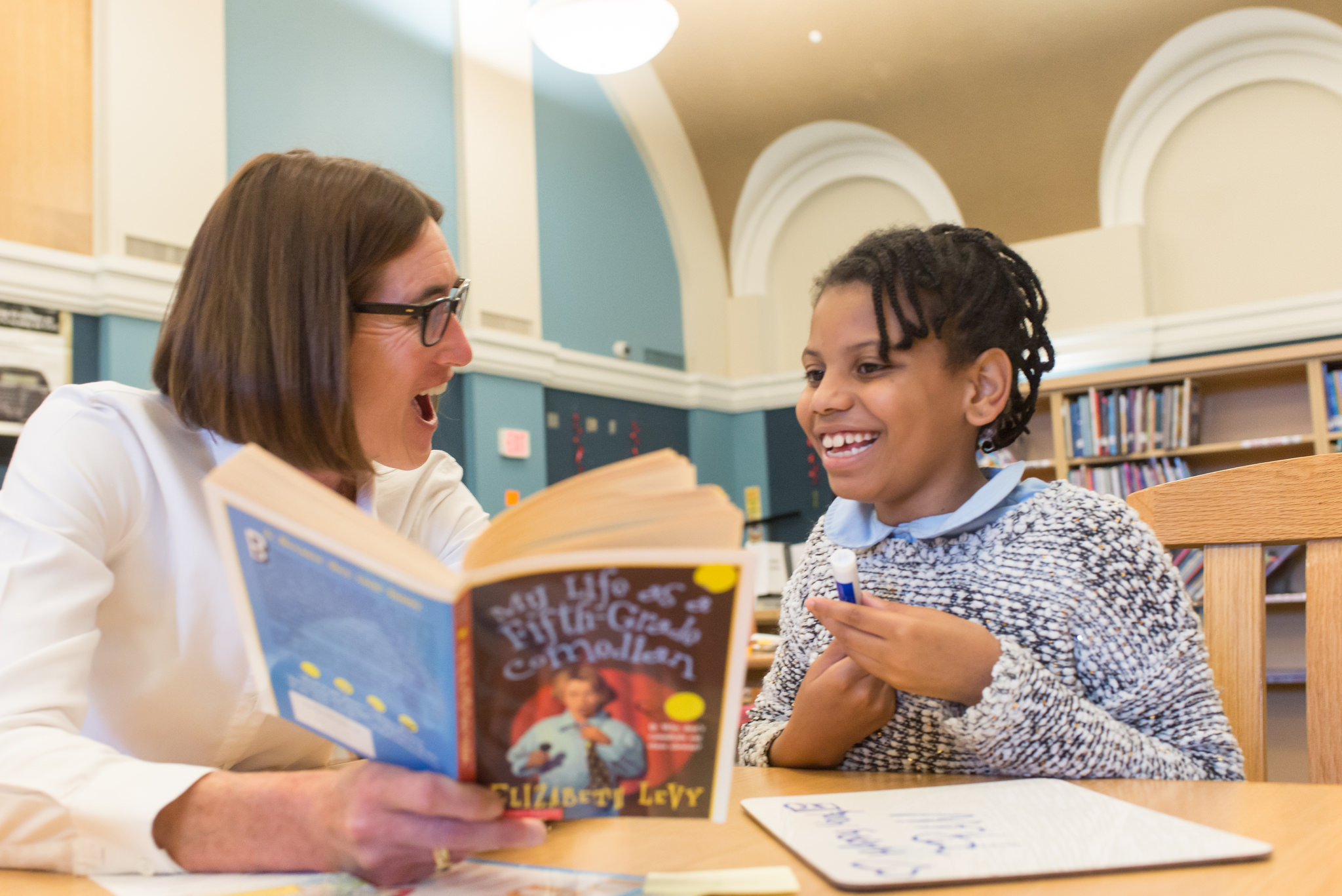 Reading partner with a student