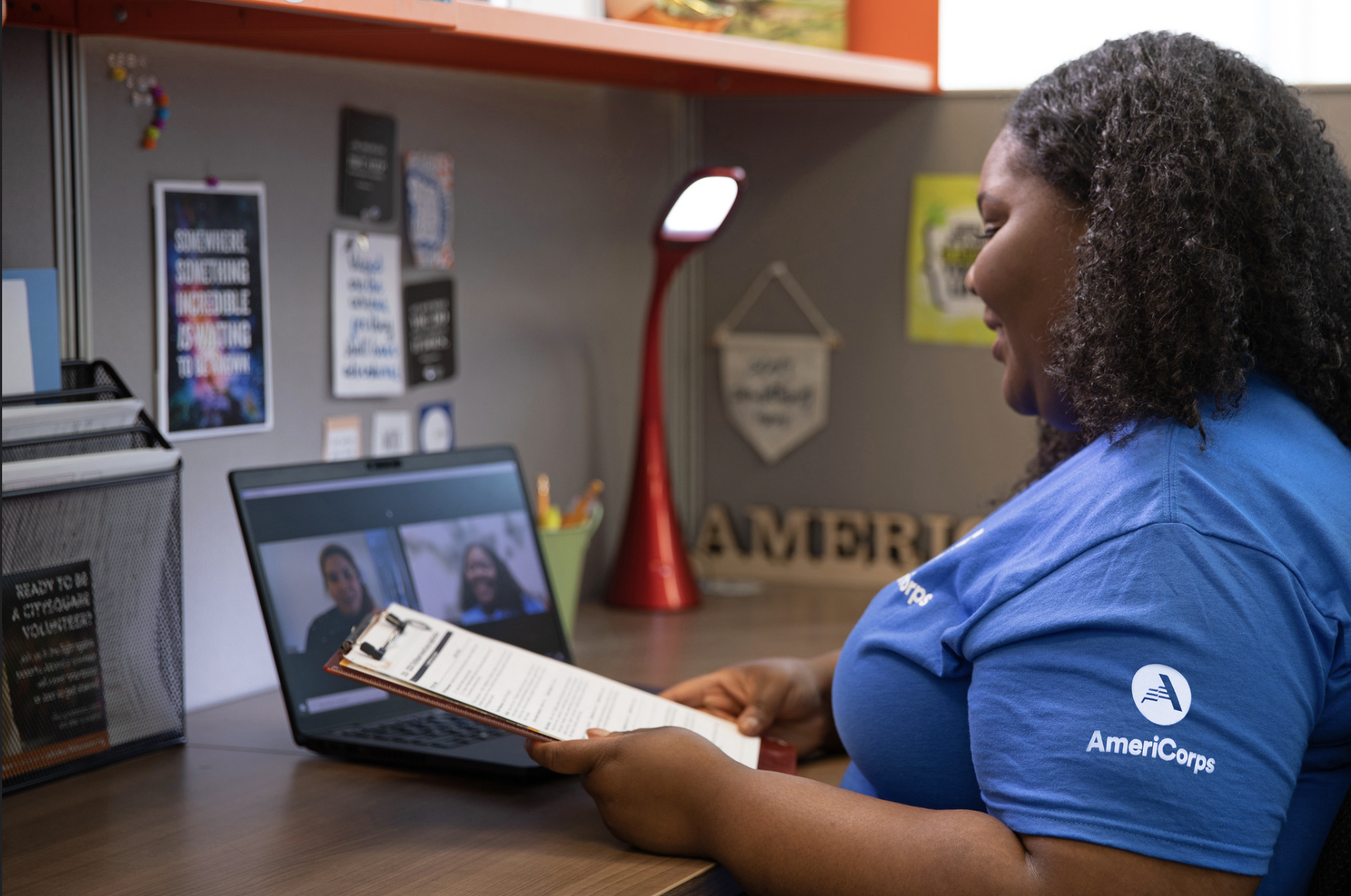 an americorps member connects with families via Zoom as part of our partnership with brilliant detroit