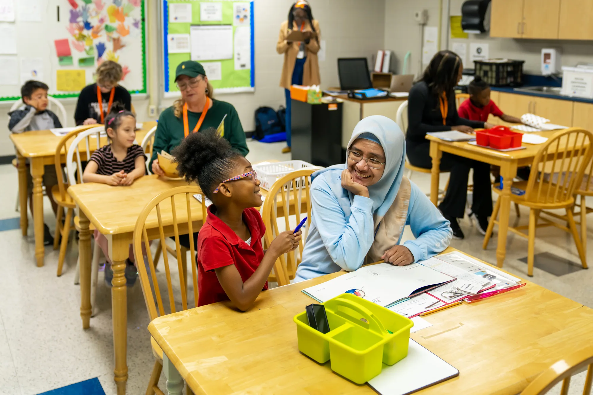 a reading center full of student-tutor pairs