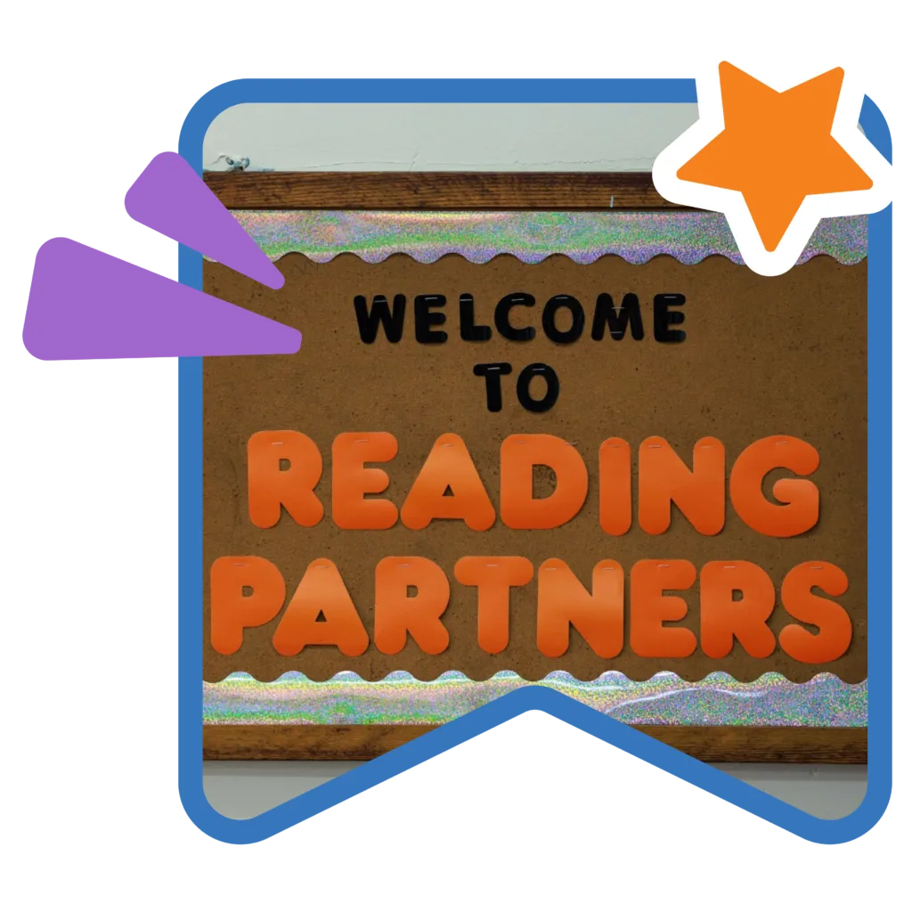 bulletin board sign that reads "welcome to reading partners"